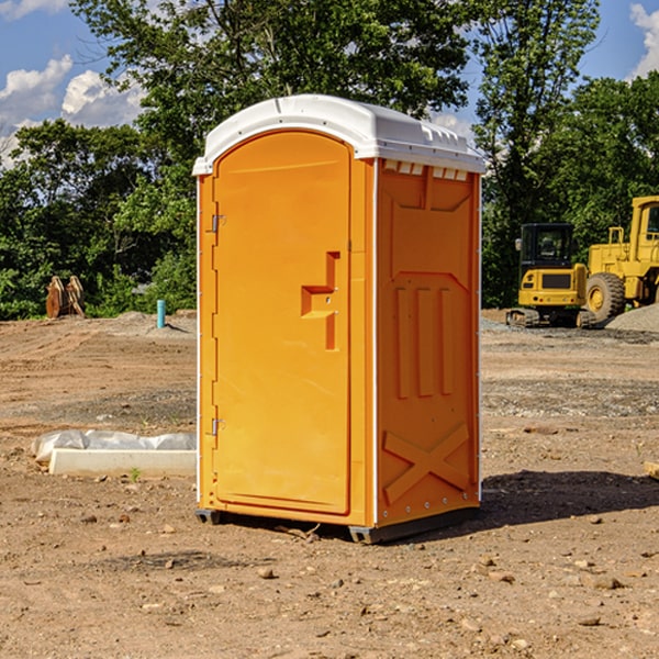 how often are the portable restrooms cleaned and serviced during a rental period in Ashford